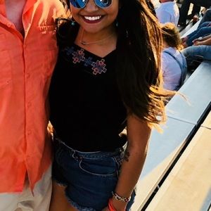 Black embroidered top from Cavenders